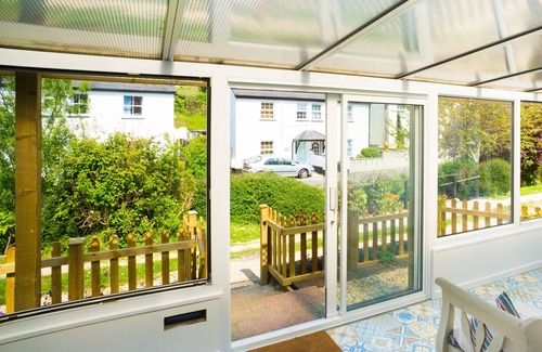 Lyme Regis Cottage | Homestead, Lyme Regis is a cosy riverside cabin, 10 mins walk from the beach