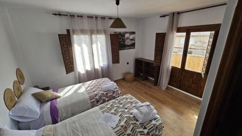 Peralejos de las Truchas House | Hostal Altajo