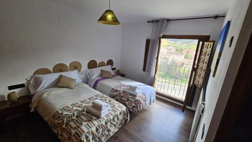 Peralejos de las Truchas House | Hostal Altajo
