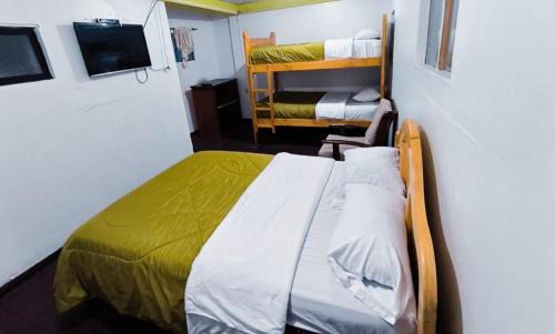 Banos de Agua Santa House | Hostal Central Baños de Agua Santa