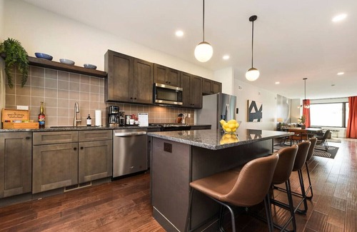 Central Northside House | ★ HostWise Stays ★ 3 King Beds! Garage! Theater! Great Location!