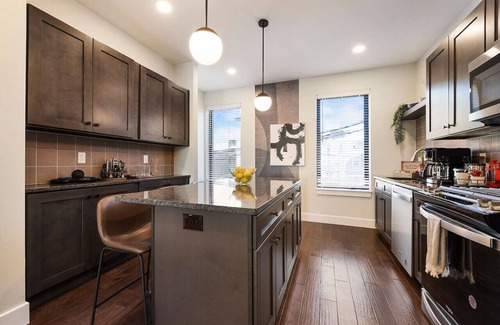 Central Northside House | ★ HostWise Stays ★ 3 King Beds! Garage! Theater! Great Location!