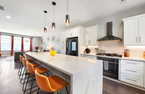 Lower Lawrenceville House | ★ HostWise Stays ★ Rooftop patio, King Bed, Garage Parking, Prime Location!