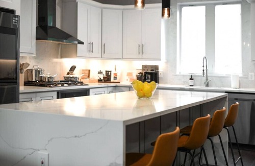 Lower Lawrenceville House | ★ HostWise Stays ★ Rooftop patio, King Bed, Garage Parking, Prime Location!
