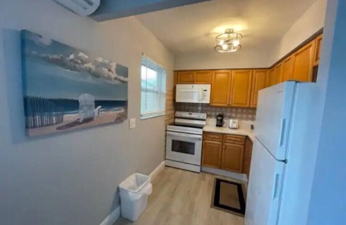 Palm Beach Shores Condo | Hot Tub, Walk to Beach, Snorkeling, Surfing
