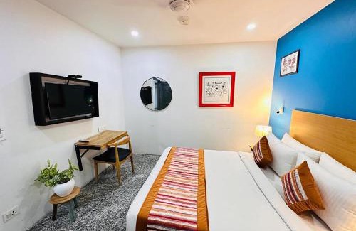 Punjabibagh Hotel | Hotel Golden Saffron By Qotel Punjabi Bagh