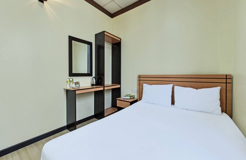 Palangkaraya Hotel | Hotel O Tri Homestay