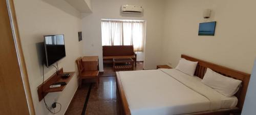 Arkalgud Hotel | HOTEL SANTALUM INTERNATIONAL LODGING & Boarding