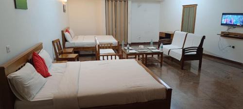 Arkalgud Hotel | HOTEL SANTALUM INTERNATIONAL LODGING & Boarding