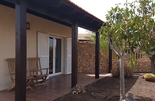 Antigua House | House with pool between gardens and olive farm.