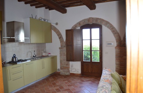 Asciano Apartment | House with private terrace and exceptional view Crete Senesi