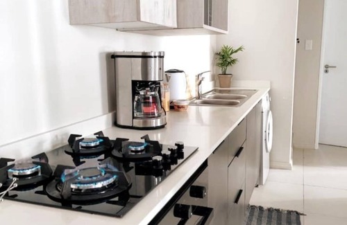 Greater Johannesburg Metropolitan Area Apartment | Icon Living at 93 on New Road Wi-Fi UPS