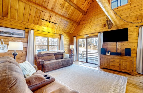 Meredith House | Idyllic lake retreat with beach access, firepit, wraparound porch, & great views