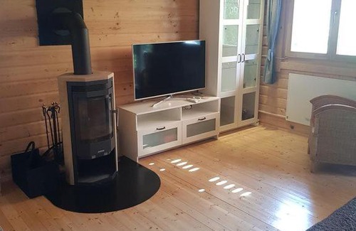 Schumachersiedlung House | Idyllische Holzhütte mit Wasserzugang und Sauna