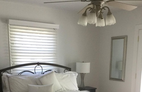 Bellport Cottage | Immaculate Bellport village cottage vacation home w/ Pool, Hot Tub, bikes & Maid