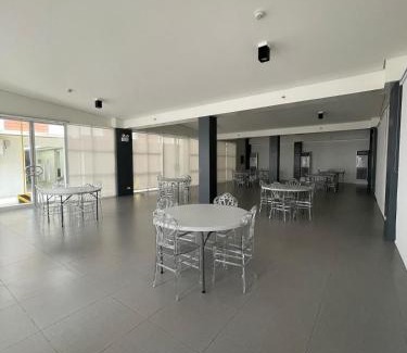 Las Pinas Apartment | Industrial Chic with Pool, Netflix, and Games in Las Pinas