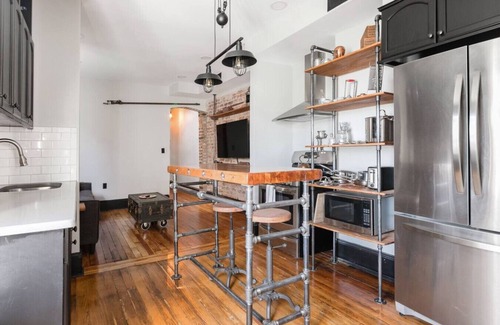 Truxton Circle Condo | Industrial Loft Offers Historic Feel Near Conv Ctr