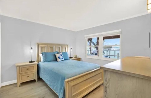 Island Estate Condo | Inter-coastal waterfront newly remodeled condo with boat lift! Bring your boat!