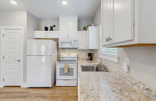 Fulton House | Inviting coastal home with shared pool and stocked pond