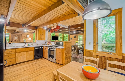 Benzonia House | Inviting home in great location with large deck, firepit, gas grill & streaming