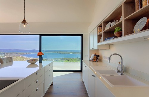 Roundstone Villa | Ireland's most spectacular view at ultra-luxury glass villa with deluxe hot tub.