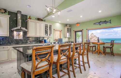 Marathon House | Isabella on Paradise Place 2 bed 2 bath with Exotic Magnificent pool and Open water views 200 ft of dockage