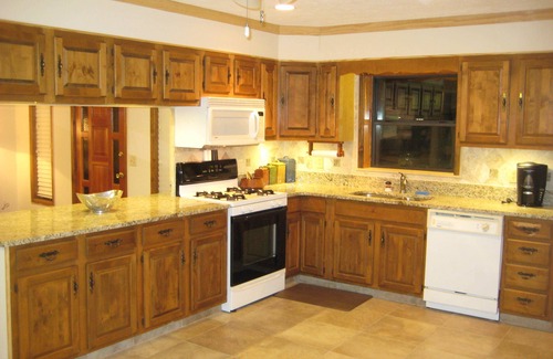 Edgar House | Island Lake Redwood Cottage With Canoe and Grill: Relax, Swim, Fish, Ski, Enjoy