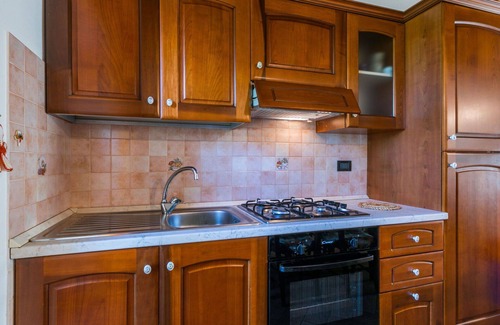 Castelnuovo di Val di Cecina Apartment | Cosy apartment for 8 people with WIFI, pool, TV, patio and pets allowed