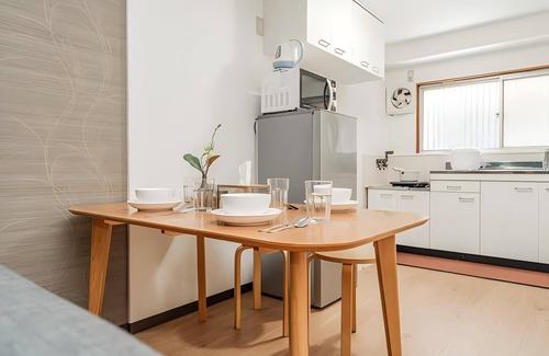 Shinsaibashi Villa | Japanese - style 2 - storey house. 1BR for 6. Kitchen, private bath.