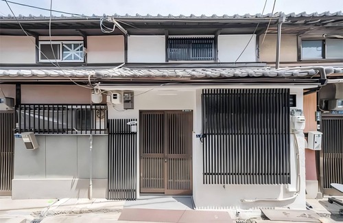 Shinsaibashi Villa | Japanese - style 2 - storey house. 1BR for 6. Kitchen, private bath.
