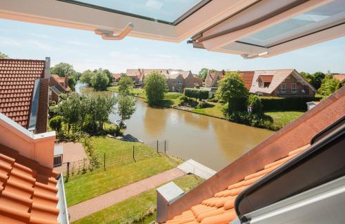 Greetsiel Apartment | Küsten Suite Ost direkte Wasserlage, 2 Balkone, 90qm