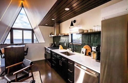 Tofte Cabin | Kalliot: Lakefront Tiny A-Frame w/Barrel Sauna + EV Charger