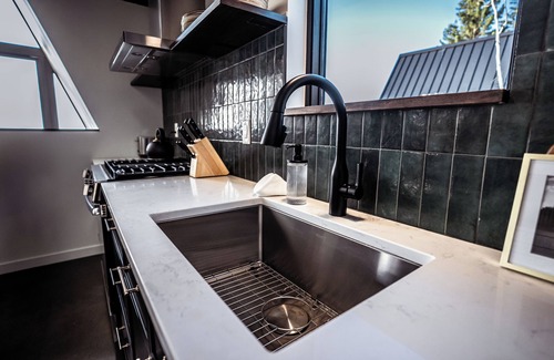 Tofte Cabin | Kalliot: Lakefront Tiny A-Frame w/Barrel Sauna + EV Charger