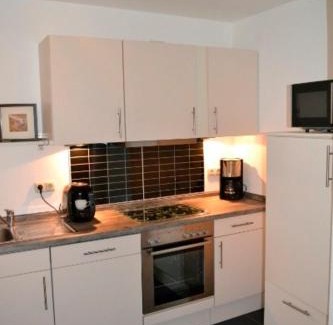 Eckernfoerde Apartment | Kapitäns Koje mit Strandkorb