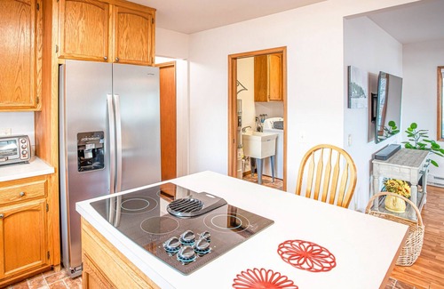 Oak Harbor Cottage | Kick Back & Watch the Day Cruise By at Cornet Bay