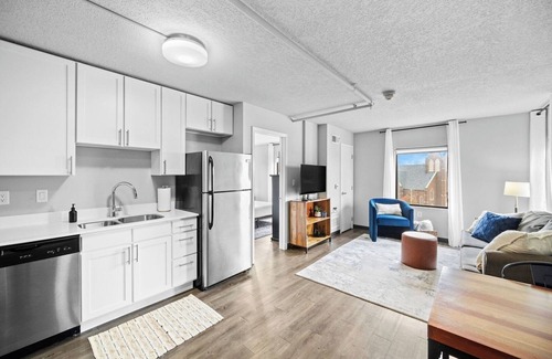 Historic East Village Apartment | King Bed | Onsite Gym | Downtown Views | Parking