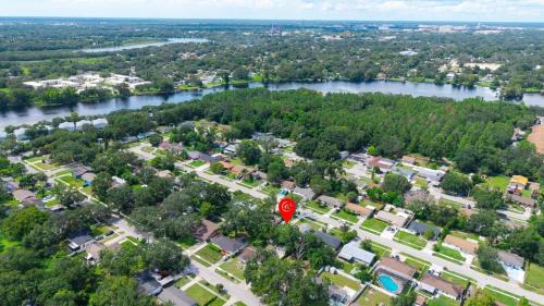 Bearss Plaza House | King-Style Retreat - 4 BR - Family Friendly