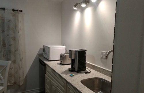 Stratford Apartment | King Suite in Stratford ambassador's Inn Next Door