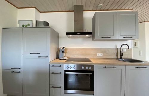Ditzum Apartment | Koje 2 - Frühstück mit Kutterblick - Ferienwohnungen Meerhuus, 45229