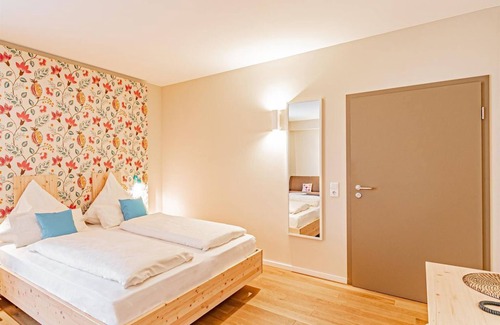 Langsur Bed & Breakfast | Komfort Doppelzimmer Barrierefrei - Weingut Johannishof