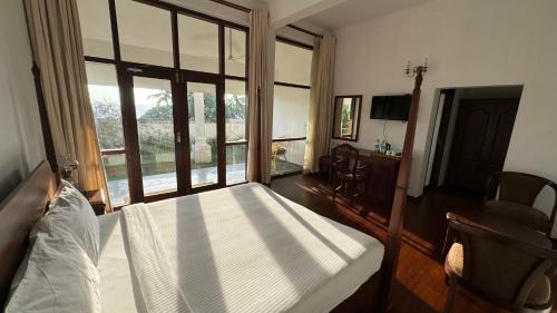 Kovalam House | Kovalam Gymkhana Thayil kadaloram