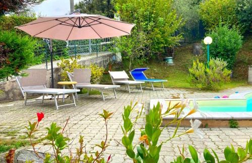 Ricco del Golfo di Spezia Apartment | La casa nel verde con piscina