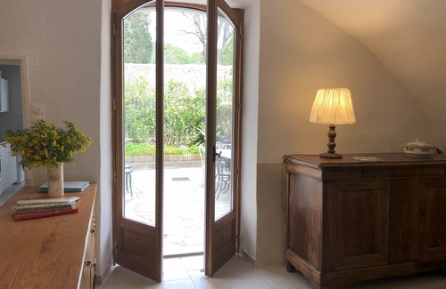 Montpeyroux House | "la maison de Marie" 17th century village house stone arches courtyard + terrace