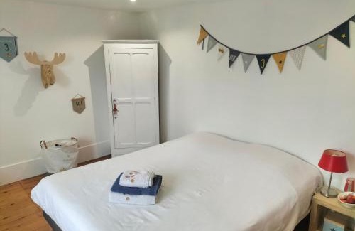 Falaise House | La maison des Remparts