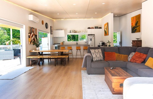 Ostend Villa | La Maison Soleil - Modern, sun-filled home with 4 bedrooms (2 kings including a stand-alone sleepout in the pool area, 2 queens) and 3 tiled bathrooms. Features a full kitchen, aircon, and open living flowing to a large garden with BBQ, heated swim s