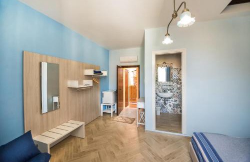 Maratea House | La stanza dell'angolo