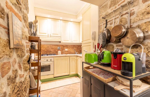 Cetona House | La Terrazza, Cetona, Tuscany, historic stone house with garden.