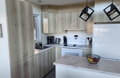 Saint-Prosper Ski Chalet | Lake and Pool table - The Dorchester