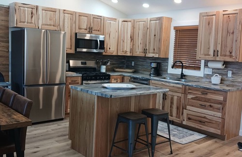 Weidman House | Lake front beauty sleeps 8, with pontoon rental available.