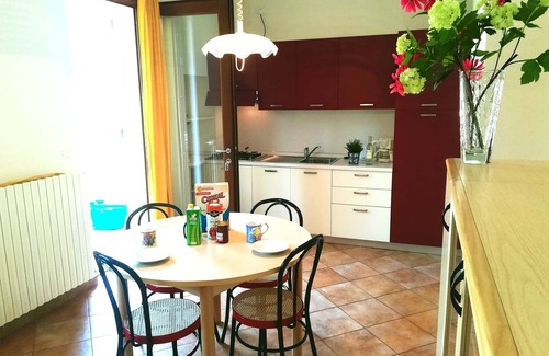 Idro Condo | Lake shore with garden